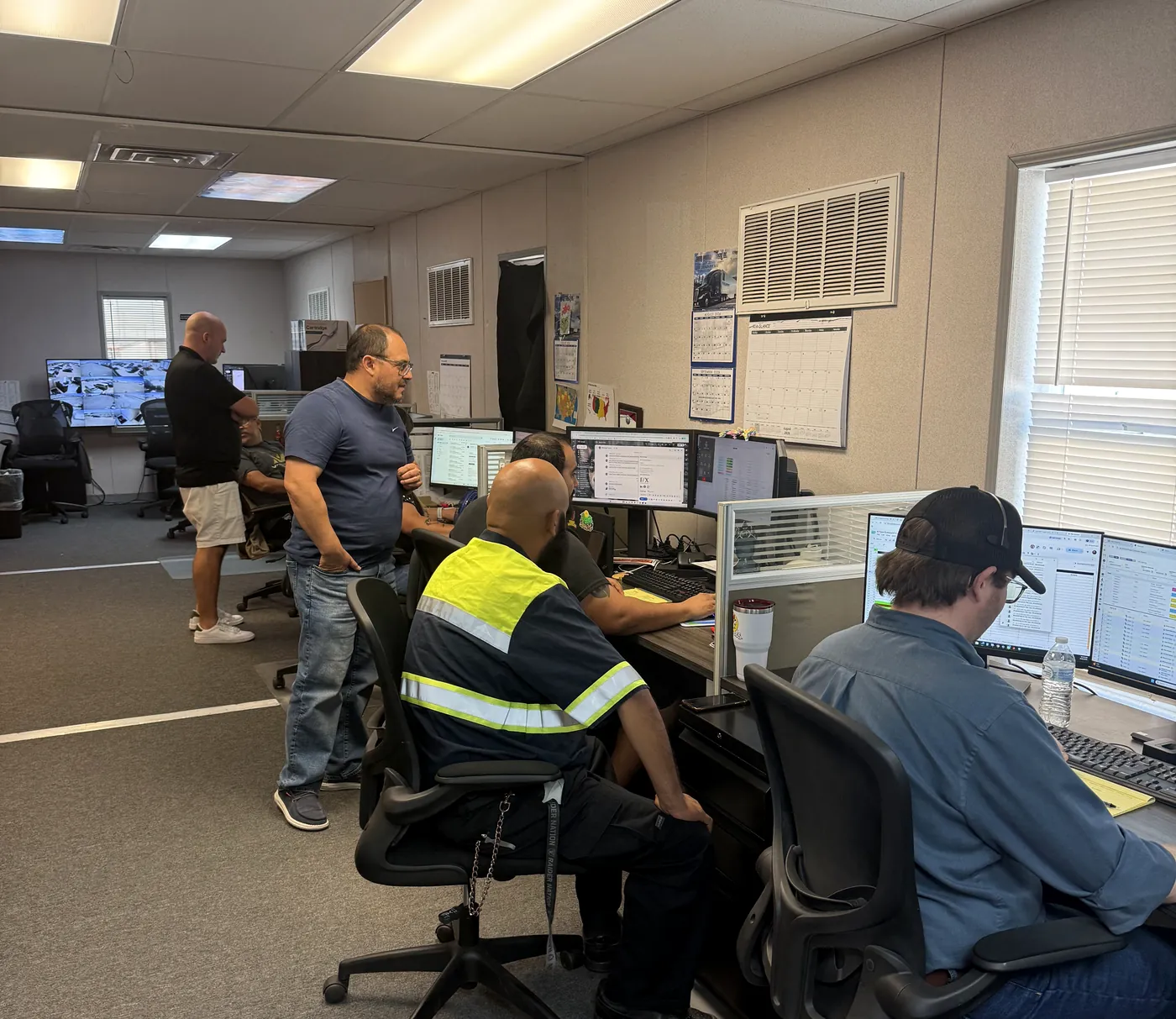 F/X dispatch office with planners at their desks